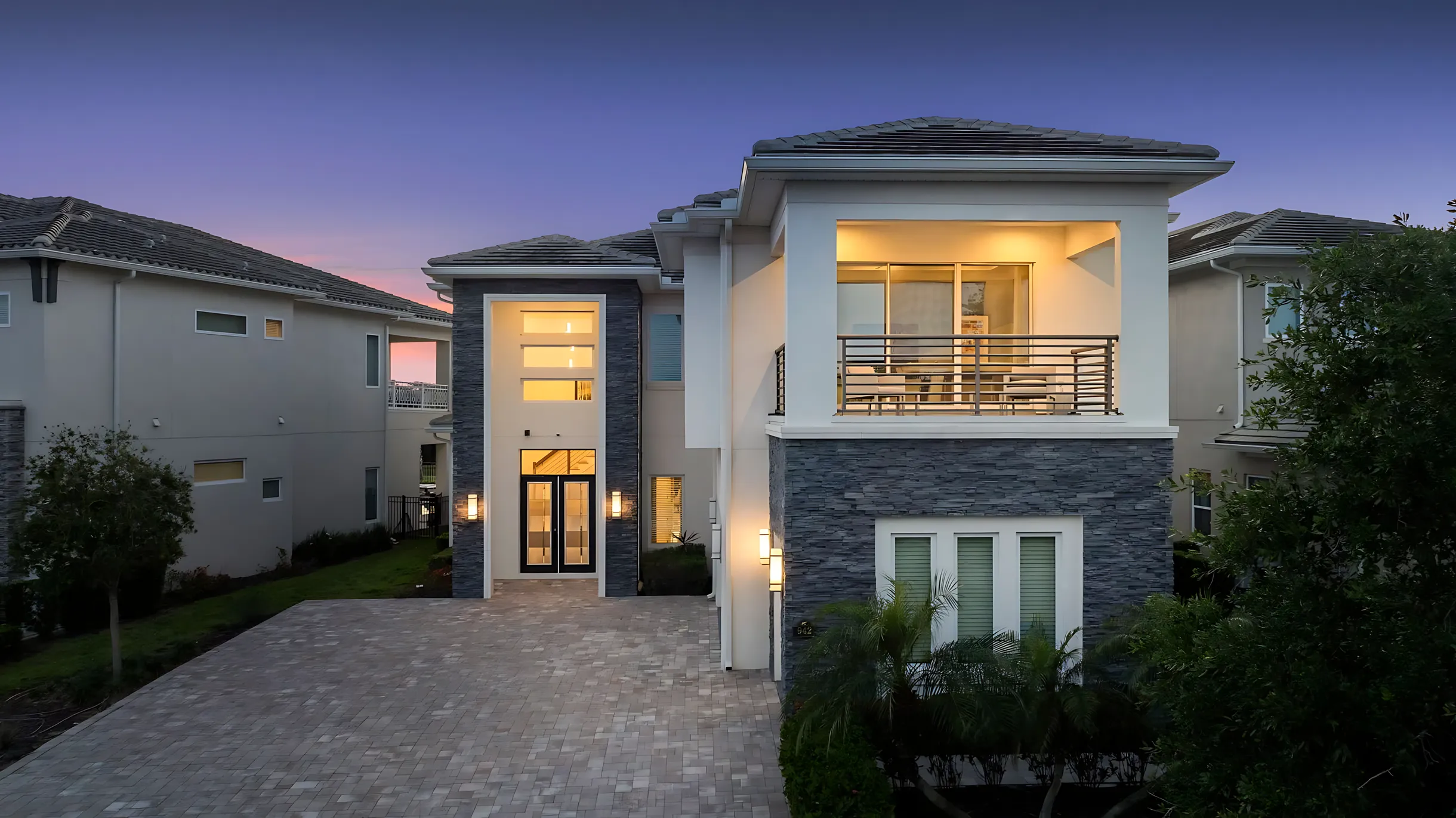 Modern luxury home exterior at twilight